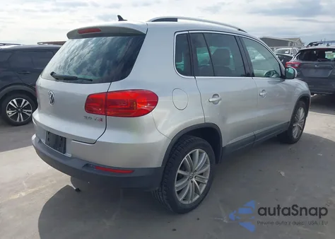 2014 Volkswagen Tiguan Sel из США, поврежденный, VIN WVGAV3AX4EW530300